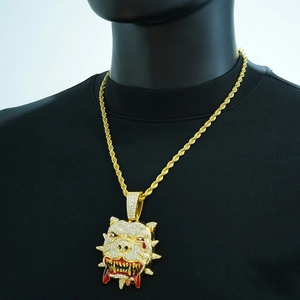 Detailed view of hip-hop iced out pitbull pendant with golden rope chain necklace