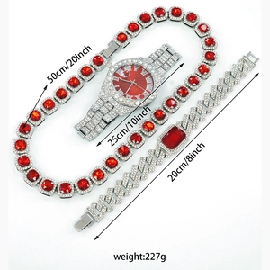 Hip hop jewelry set featuring iced-out silver watch and red gemstone necklace and bracelet