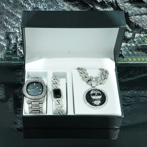 Men's hip hop jewelry set with iced-out watch, skull pendant necklace, and cuban bracelet