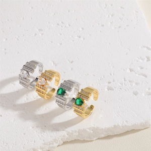 Adjustable open rings with teardrop zircons in gold and silver finish on stone