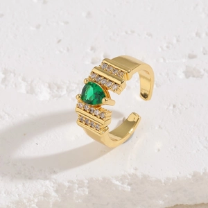 Detail view of heart-shaped green zircon on an adjustable gold-plated ring band