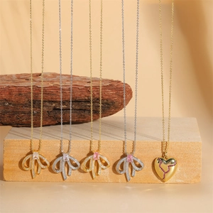 14K Vergoldete Kupfer Zirkonia Herz Schleife Anhänger Halskette Damen Mode Schleife Split Herz Eingelegte Kette Schmuck
