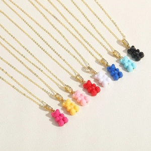 Colorful resin bear pendant necklace set with zircon accents on gold plated chains