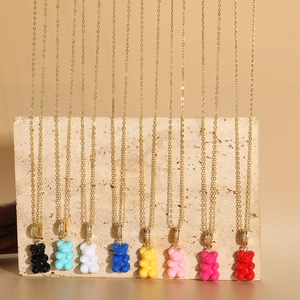 Colorful resin bear pendants on gold chains with zircon accents in 8 vibrant colors