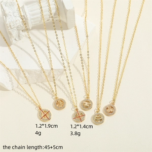 Elegant gold zircon pendant necklaces featuring diverse charms like cancer sign and lips