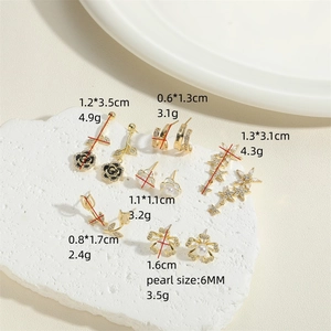 Elegant six-piece floral earring set with rose, tulip and pearl charms in gold finish