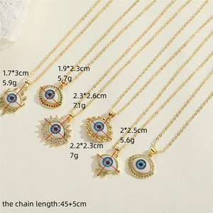 Golden evil eye pendant necklace set with zircon eyelashes and colorful crystal stones