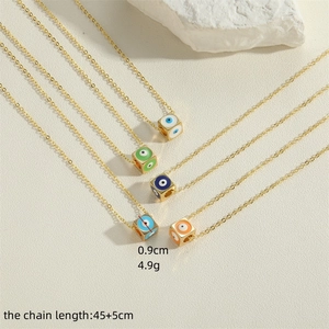 Gold dice Evil Eye necklaces in colorful styles including blue and orange for women