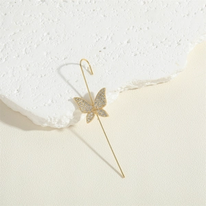 Elegant gold butterfly ear crawler with sparkling cubic zirconia on a stone base