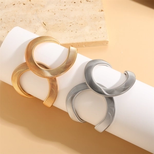 French vintage crossover bangles in gold and silver finish with spiral texture