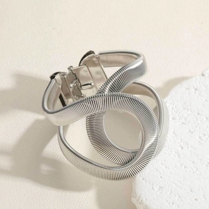 Elegant silver metallic twisted spring belt with square buckle on decorative stone
