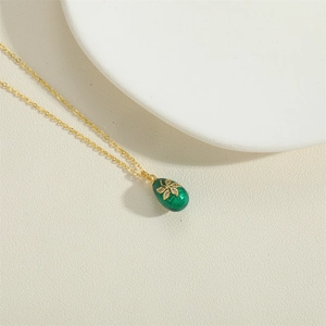French vintage zircon flower egg pendant necklace with green enamel on a golden chain