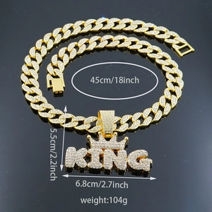 Iced out gold Cuban chain with king crown pendant and crystal embellishments for men