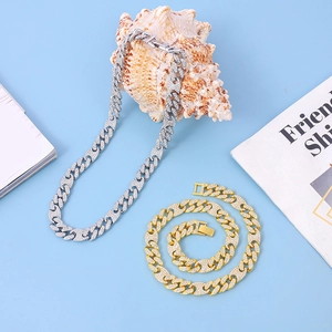 Iced out cuban link necklaces in gold and silver finish with hip hop rhinestone detail