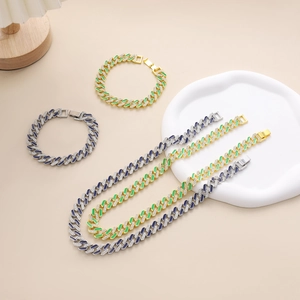Detail of colorful enamel link Cuban chain necklace and bracelet set with micro-inlay stones