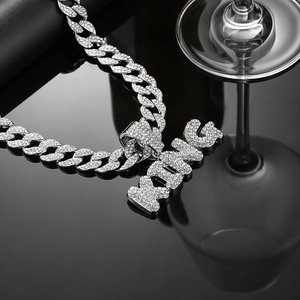 Hip hop silver-tone Cuban link necklace with iced-out KING pendant and pavé rhinestones