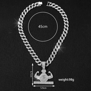 Close-up of hip hop money bag pendant with crystals and thick cuban link chain