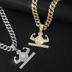 Iced out gold and silver Cuban link necklaces with muscular money bag pendants