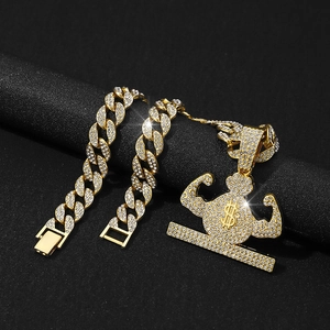 Macro shot of iced out gold cuban chain and muscular money bag pendant with dollar sign