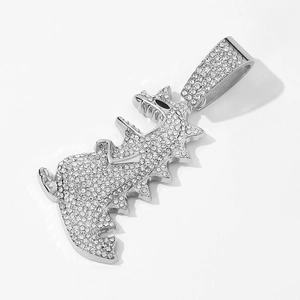 Hip hop silver dinosaur pendant with micro-paved white zircons on a white background