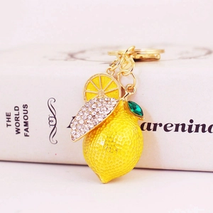 Sparkling lemon fruit keychain with yellow enamel and rhinestones for bags