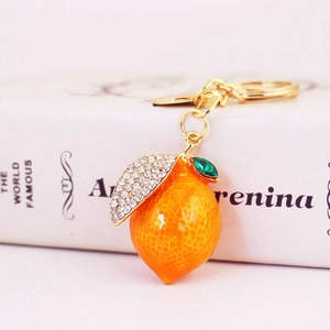 Sparkling orange lemon keychain with rhinestones and gold hardware for bag accessory