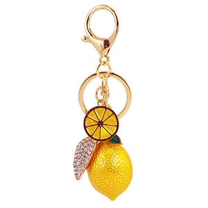 Sparkling lemon keychain with yellow enamel fruit, rhinestones, and gold-plated lobster clasp