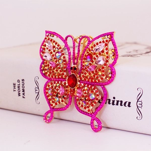 Porte-clés papillon élégant orné de strass étincelants rouges et roses sur métal doré
