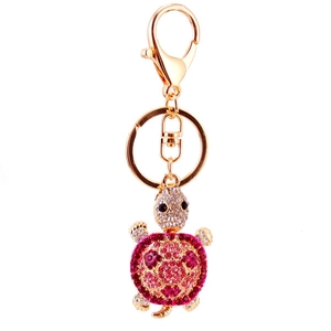 Sparkling crystal sea turtle keychain with pink rhinestones and gold-tone metal ring