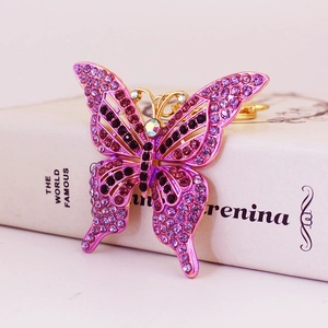 Porte-clés papillon exquis avec strass dégradés violets sur base en métal doré