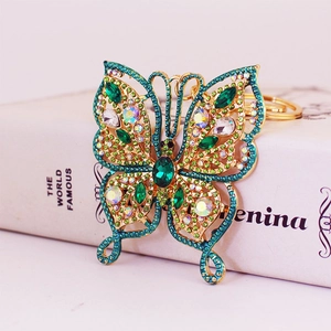 Porte-clés papillon exquis avec cristaux vert émeraude et placage en or vintage