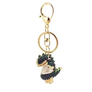 Sparkling crystal dinosaur keychain with green rhinestones and golden lobster clasp for bags