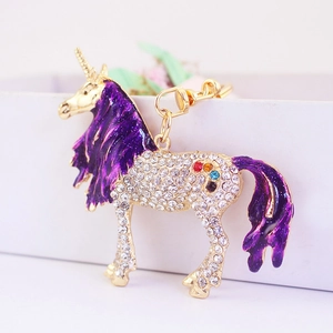 Unicorn keychain with sparkling rhinestones and purple enamel on golden metal base