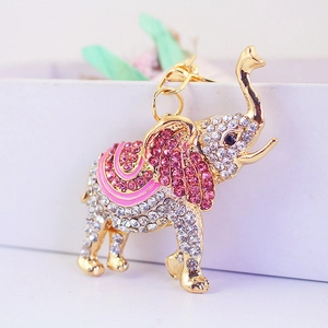 Porte-clés éléphant étincelant avec cristaux roses et finition en métal doré
