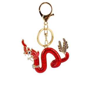 Portachiavi con drago cinese rosso e oro con strass bianchi e chiusura dorata
