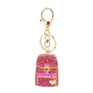 Pink rhinestone backpack keychain with golden metal finish and heart charm ornament
