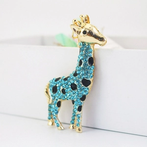 Cute golden giraffe keychain pendant featuring vibrant blue rhinestones and black spots