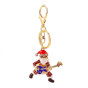 Porte-clés Père Noël avec guitare en strass et fermoir mousqueton doré de qualité