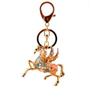 Porte-clés Pégase doré orné de pierres d'opale et strass brillants pour sacs à main