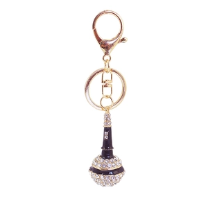 Creative microphone keychain with gold metal finish and sparkling white rhinestones