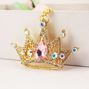 Golden crown keychain featuring a pink teardrop gemstone and sparkling crystals