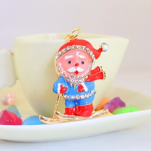 Cute Santa Claus on scooter enamel keychain with sparkling rhinestones for bags
