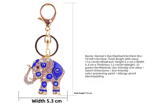 Detail view of Evil Eye elephant keychain with blue enamel and Czech rhinestones