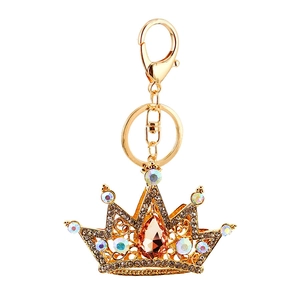 Luxurious crown crystal keychain with golden alloy frame and sparkling diamond accents