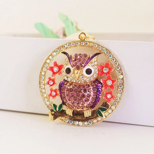 Sparkling crystal owl keychain with colorful flower charms and gold finish for women