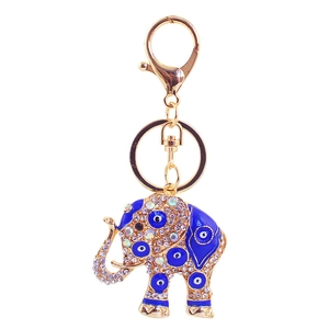 Golden elephant keychain with blue enamel, sparkling crystals and evil eye charms