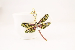 Close-up of colorful rhinestone dragonfly keychain with gold alloy lobster clasp
