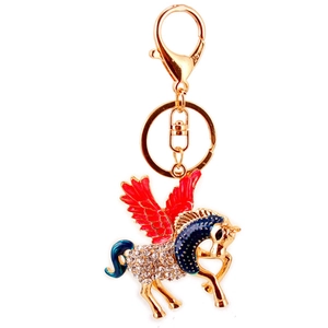 Portachiavi unicorno scintillante con ali rosse e smalto blu su lega dorata