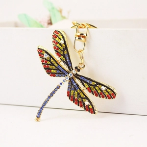 Colorful dragonfly keychain with crystal rhinestones on a gold metal base and spring ring