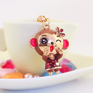 Cute enamel monkey keychain for women featuring pink flower and red polka dot dress